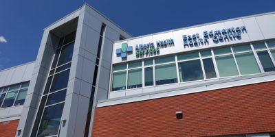 East Edmonton Health Care Centre exterior looking up with signage