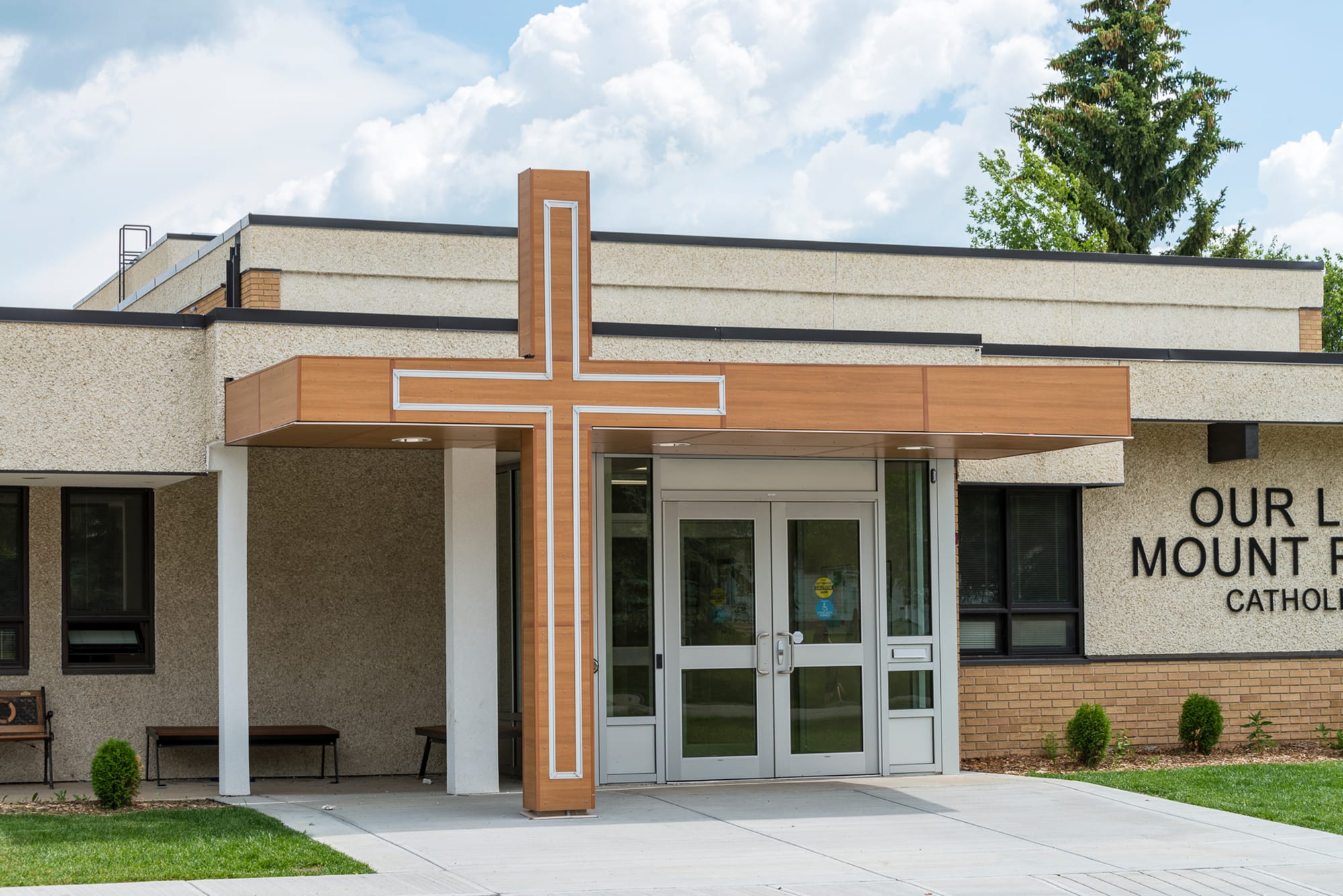 Our Lady of Mount Pleasant School exterior front entrance with cross