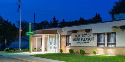 Our Lady of Mount Pleasant School exterior at night