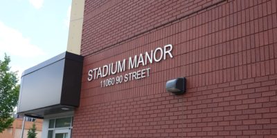 Stadium Manor exterior with signage