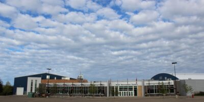 Panoramic View of Slave Lake Multi-Rec Centre's Front Facade.