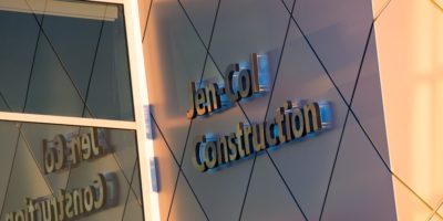 JEN COL Construction exterior wall with signage