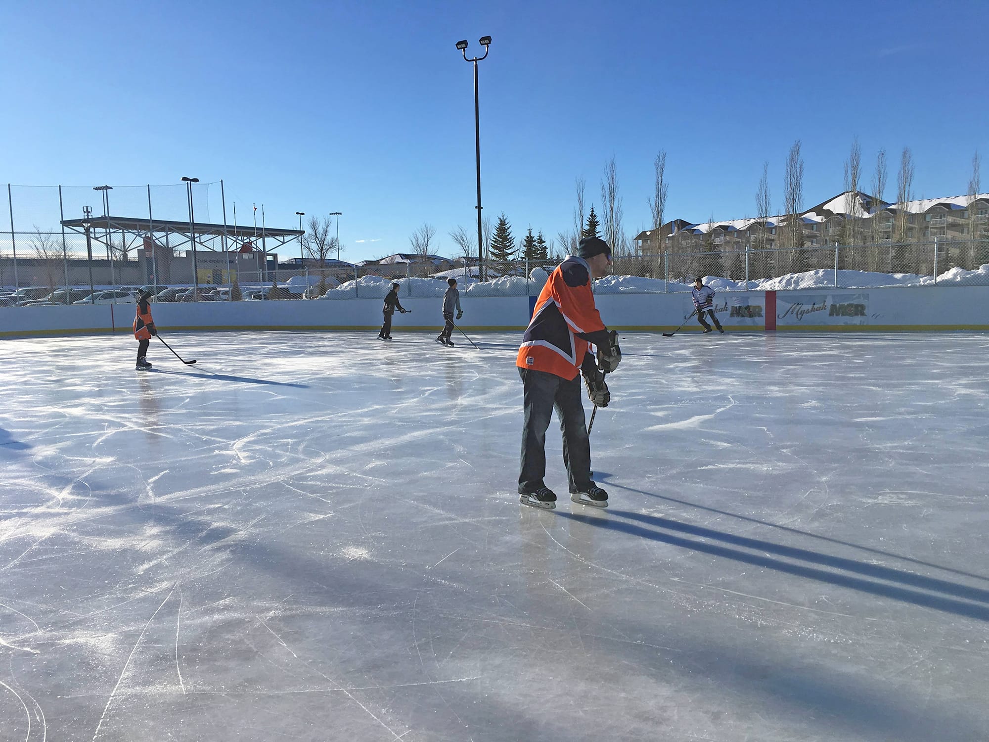 Tri Leisure Centre Outdoor Arena with hockey players